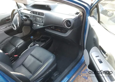 2012 Toyota Prius C Four z USA, uszkodzony, nr VIN JTDKDTB30C1015652